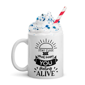 Stay Close to What Keeps you Feeling Alive MUG.