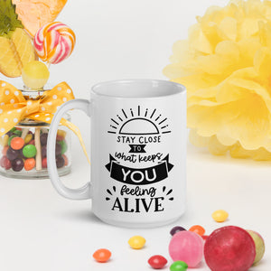 Stay Close to What Keeps you Feeling Alive MUG.